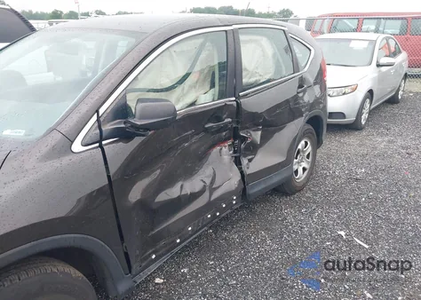 2014 Honda Cr-V Lx z USA, uszkodzony, nr VIN 2HKRM3H34EH521468